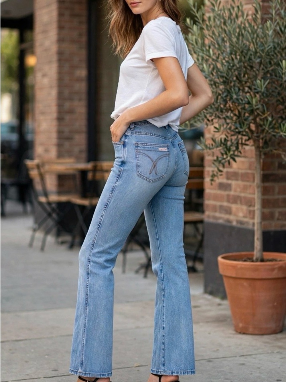 Vintage 90s/Y2K Calvin Klein Jeans in light
Sandblast wash Bootcut Size 6